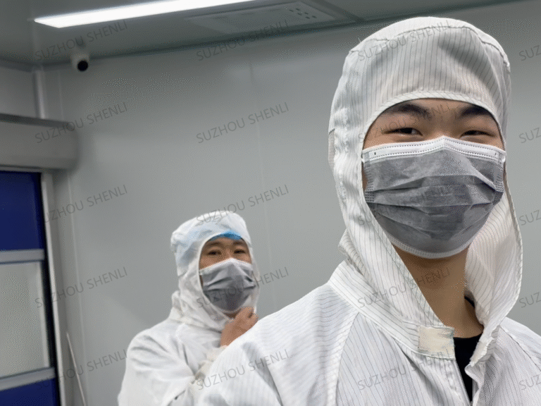 Employees of an organic glass polycarbonate sheet factory with hardened anti-static coating