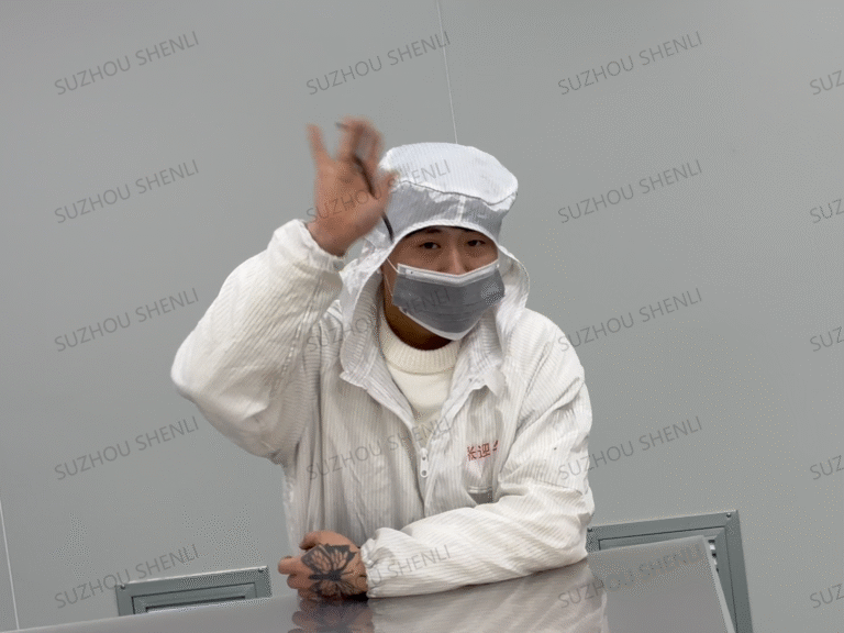 Employees of an organic glass polycarbonate sheet factory with hardened anti-static coating